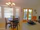 Light filled dining area with views to a backyard and access to outdoor living at 4513 E Grovers Ave, Phoenix, AZ 85032