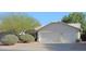 Charming home with a three-car garage, mature trees and low maintenance landscaping at 4513 E Grovers Ave, Phoenix, AZ 85032