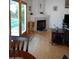 Comfortable living room with a fireplace and access to the backyard at 4513 E Grovers Ave, Phoenix, AZ 85032
