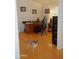 Functional office space with a spacious desk, ergonomic chair, and ample storage at 4513 E Grovers Ave, Phoenix, AZ 85032