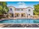 Spacious backyard with a gorgeous pool and covered patio, great for outdoor entertainment at 4517 W Lodge Dr, Laveen, AZ 85339