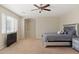 This main bedroom has neutral paint, carpet and a ceiling fan at 4517 W Lodge Dr, Laveen, AZ 85339