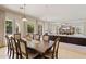 Elegant dining room showcases a formal table with ornate chairs and a view into the living area at 4517 W Lodge Dr, Laveen, AZ 85339