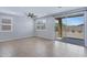 Bright living space with tile flooring, recessed lighting, ceiling fan, and sliding glass doors at 4628 W Greenleaf Dr, San Tan Valley, AZ 85144