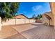 This spacious backyard offers privacy, plenty of space for to play, and room for BBQ grill at 4639 E Cabrillo Dr, Gilbert, AZ 85297