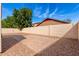 This spacious backyard has hardscape, privacy walls, desert landscaping, and plenty of room for entertaining at 4639 E Cabrillo Dr, Gilbert, AZ 85297