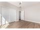 Modern bedroom with ample closet space and a door, creating a clean and inviting space at 4639 E Cabrillo Dr, Gilbert, AZ 85297