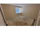 A bright bedroom with neutral-toned walls and a window providing natural light at 4721 N 55Th Dr, Phoenix, AZ 85031