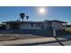 Single-story home featuring a covered parking and desert landscaping at 4721 N 55Th Dr, Phoenix, AZ 85031