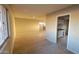 View of living room showcasing tile flooring leading to kitchen at 4721 N 55Th Dr, Phoenix, AZ 85031
