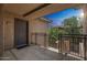 Exterior of the building with a private balcony, offering outdoor living space and neighborhood views at 5401 E Van Buren St # 3048, Phoenix, AZ 85008