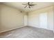 This bedroom features plush carpeting and two closets for storage at 5401 E Van Buren St # 3048, Phoenix, AZ 85008