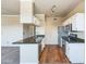 Efficient kitchen with stainless steel appliances, dark countertops, and ample storage space at 5401 E Van Buren St # 3048, Phoenix, AZ 85008