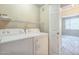 A conveniently located laundry room features a washer and dryer for added convenience at 5401 E Van Buren St # 3048, Phoenix, AZ 85008