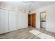 This bedroom features lots of closet space and an attached bathroom at 5437 E Pinchot Ave, Phoenix, AZ 85018
