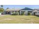 Well-maintained single-story home with a lush green lawn and desert landscaping at 5437 E Pinchot Ave, Phoenix, AZ 85018
