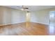 View of the light-filled living room with wood floors at 5437 E Pinchot Ave, Phoenix, AZ 85018