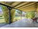This covered patio area has plants all around it and shade from the Arizona sun at 5437 E Pinchot Ave, Phoenix, AZ 85018