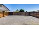Rear yard featuring gravel ground cover and wood fence at 5504 N 69Th Ave, Glendale, AZ 85303