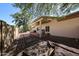 Private backyard featuring a pergola, air conditioner, and gravel ground cover, perfect for relaxation at 5521 W Northwood Dr, Glendale, AZ 85310
