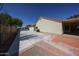 Spacious backyard featuring a concrete patio and stone landscaping, ideal for outdoor activities and gatherings at 5521 W Northwood Dr, Glendale, AZ 85310