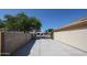Wide concrete driveway offering ample parking space, with a glimpse of the property's facade at 5521 W Northwood Dr, Glendale, AZ 85310