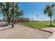 Community gathering place, showing putting green and clubhouse on a sunny day at 7326 E Juanita Ave, Mesa, AZ 85209