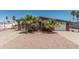 Charming home featuring a low maintenance yard, white garage door and palm tree landscaping at 7326 E Juanita Ave, Mesa, AZ 85209
