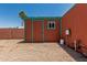 A storage shed in backyard, offering additional storage space for tools and equipment at 7326 E Juanita Ave, Mesa, AZ 85209