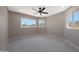 Bedroom featuring plush carpet, recessed lighting, and several windows to bring in natural light at 7535 W Kimberly Way, Glendale, AZ 85308