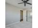 Neutral bedroom featuring mirrored closet doors, carpet floor, neutral paint, and white trim at 7535 W Kimberly Way, Glendale, AZ 85308