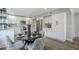 Cozy dining area with white cabinets, stainless steel appliances, and stylish decor at 7535 W Kimberly Way, Glendale, AZ 85308