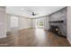 Expansive living room with hardwood floors, fireplace, and natural light at 7535 W Kimberly Way, Glendale, AZ 85308