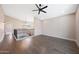 Upstairs loft space with wood floors, recessed lighting, and a view overlooking the community at 7535 W Kimberly Way, Glendale, AZ 85308