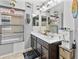 Bathroom featuring a double vanity, decorative accents, and ample counter space at 7575 W Darrel Rd, Laveen, AZ 85339