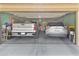 Spacious two car garage showcasing ample parking and storage space for vehicles and household items at 7575 W Darrel Rd, Laveen, AZ 85339