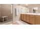 A spacious bathroom showcases double sinks, a shower, and ample counter space for a luxurious experience at 7617 E Desert Honeysuckle Dr, Gold Canyon, AZ 85118