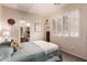 Cozy bedroom featuring plantation shutters for adjustable natural light and stylish decor, creating a serene retreat at 7617 E Desert Honeysuckle Dr, Gold Canyon, AZ 85118