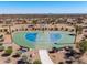 Aerial view of a basketball court with lush landscaping, perfect for outdoor activities at 8055 E Jaeger St, Mesa, AZ 85207