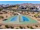 A basketball court is in a well-maintained neighborhood with desert landscaping at 8055 E Jaeger St, Mesa, AZ 85207