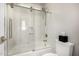 Cozy bathroom with white tub, glass shower door, and modern fixtures at 8055 E Jaeger St, Mesa, AZ 85207