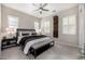 Spacious bedroom with lots of natural light, neutral decor, and stylish furniture at 8055 E Jaeger St, Mesa, AZ 85207
