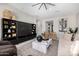 Bright living room showcasing stylish decor, a large area rug, and comfortable seating at 8055 E Jaeger St, Mesa, AZ 85207