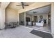 Inviting patio with an open door looking into a modern living room at 8055 E Jaeger St, Mesa, AZ 85207
