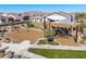 Neighborhood playground with swings, climbing web and shade canopy in Monteluna, a Gathering-friendly community at 8055 E Jaeger St, Mesa, AZ 85207