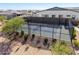 A well-maintained tennis court within a residential community, perfect for recreational play at 8055 E Jaeger St, Mesa, AZ 85207