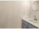 Bathroom features a new vanity with a sleek countertop and a modern faucet at 830 E Gila Ln, Chandler, AZ 85225