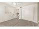 Bright bedroom features neutral carpet and a closet with sliding doors at 830 E Gila Ln, Chandler, AZ 85225