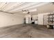 Spacious garage offers ample room for parking and storage with included laundry area at 830 E Gila Ln, Chandler, AZ 85225