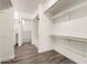 A large walk-in closet providing ample storage space, plus attached bathroom at 830 E Gila Ln, Chandler, AZ 85225